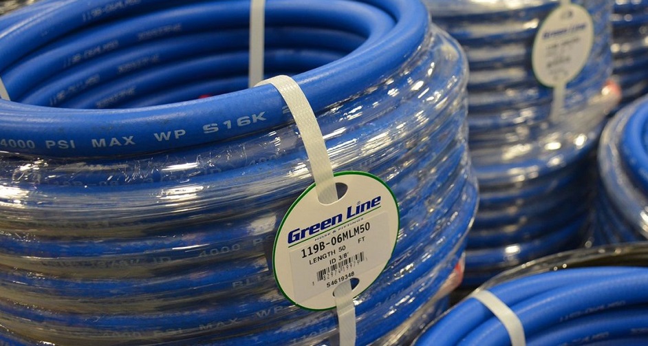 Stacks of blue hose from Green Line