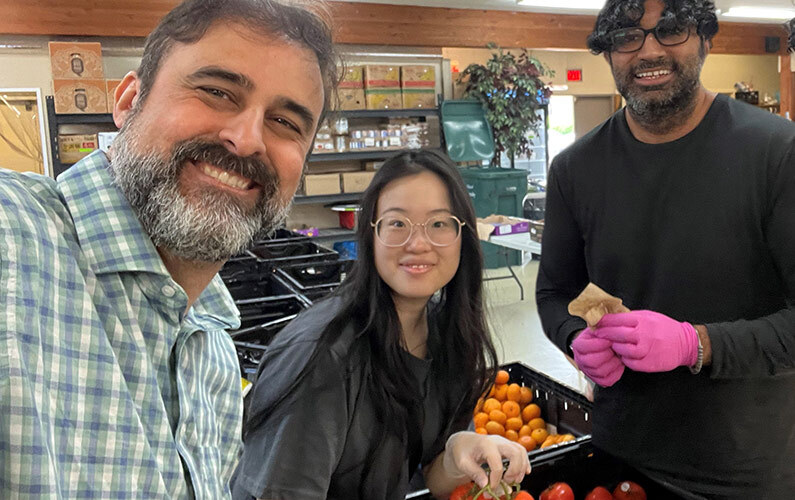 Snaptech team members volunteering for food sorting in Burnaby