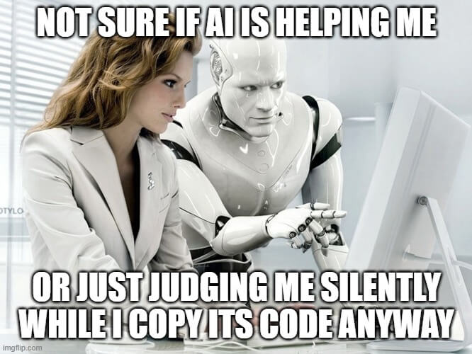 A humanoid robot sits beside a woman at a computer, pointing at the screen. Caption reads: “Not sure if AI is helping me or just judging me silently while I copy its code anyway.”
