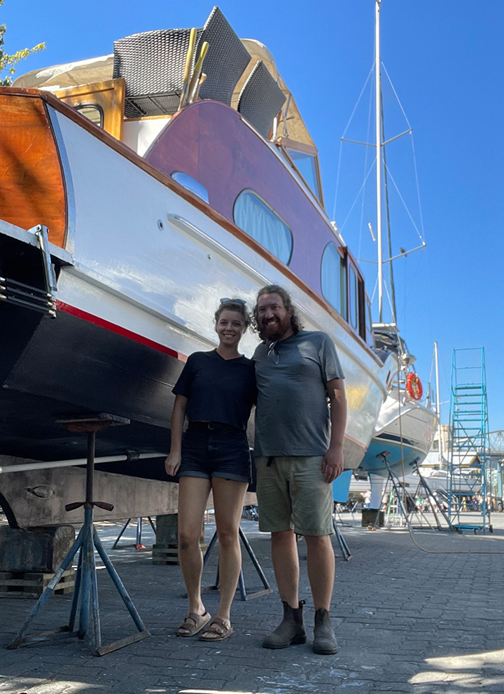 Alistair Hayward with his wife, Hannah, and their boat