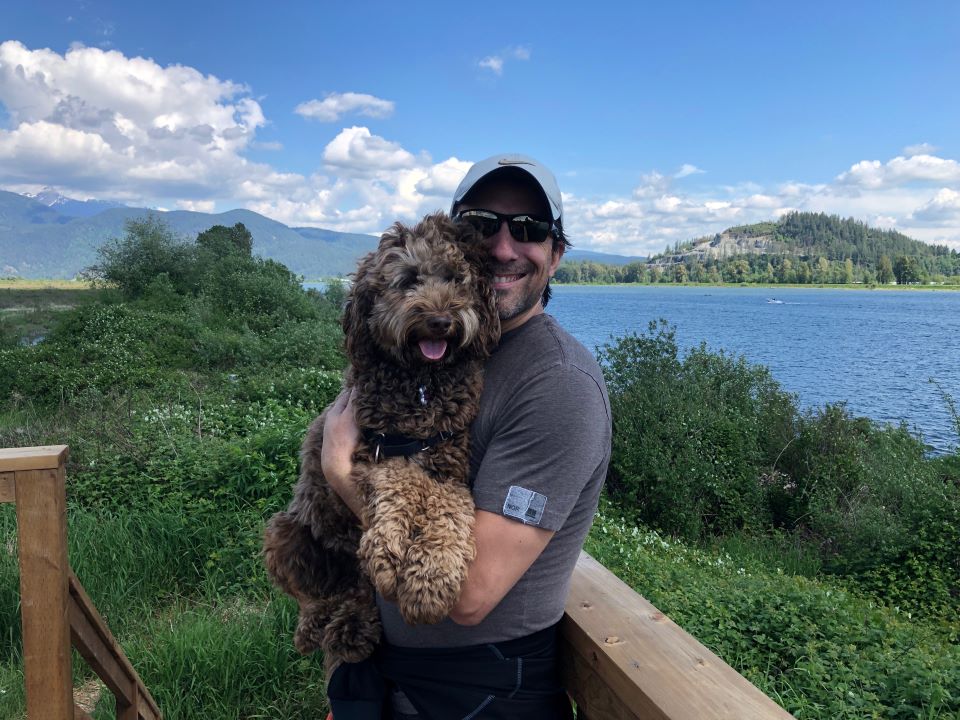 Flavio, Co-Founder of Snaptech, with his dog, Lacie
