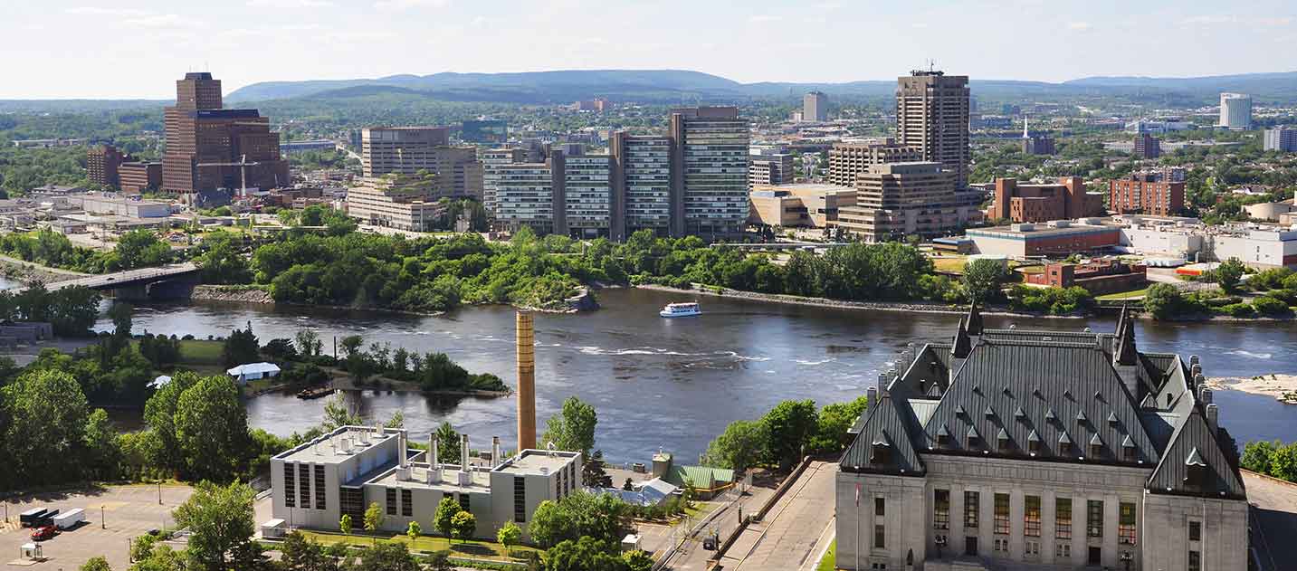 The city skyline of Gatineau, Quebec, across the Ottawa River from downtown Ottawa, Ontario.