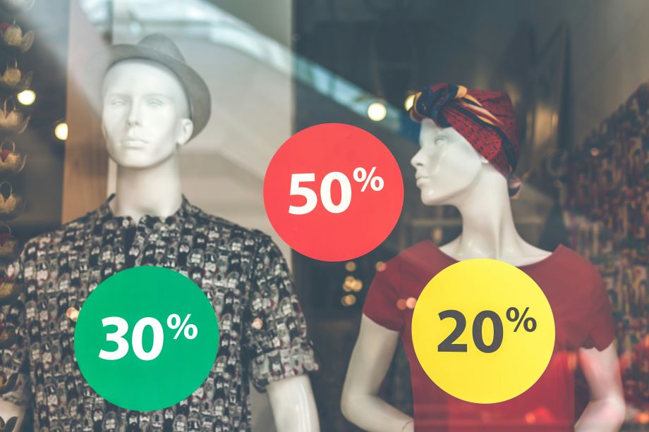sale-discount-full Sale stickers on a shop window reflect dynamic pricing