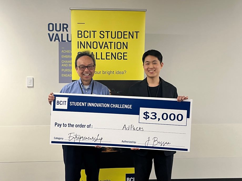BCIT grad and Snaptech intern, Andy, with a $3000 AdPacks cheque